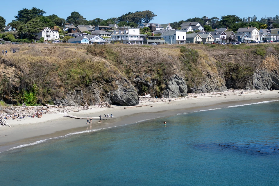 Houses above the cove on the far side