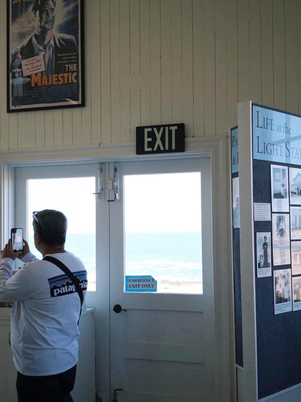 Someone taking a photo in the doorway