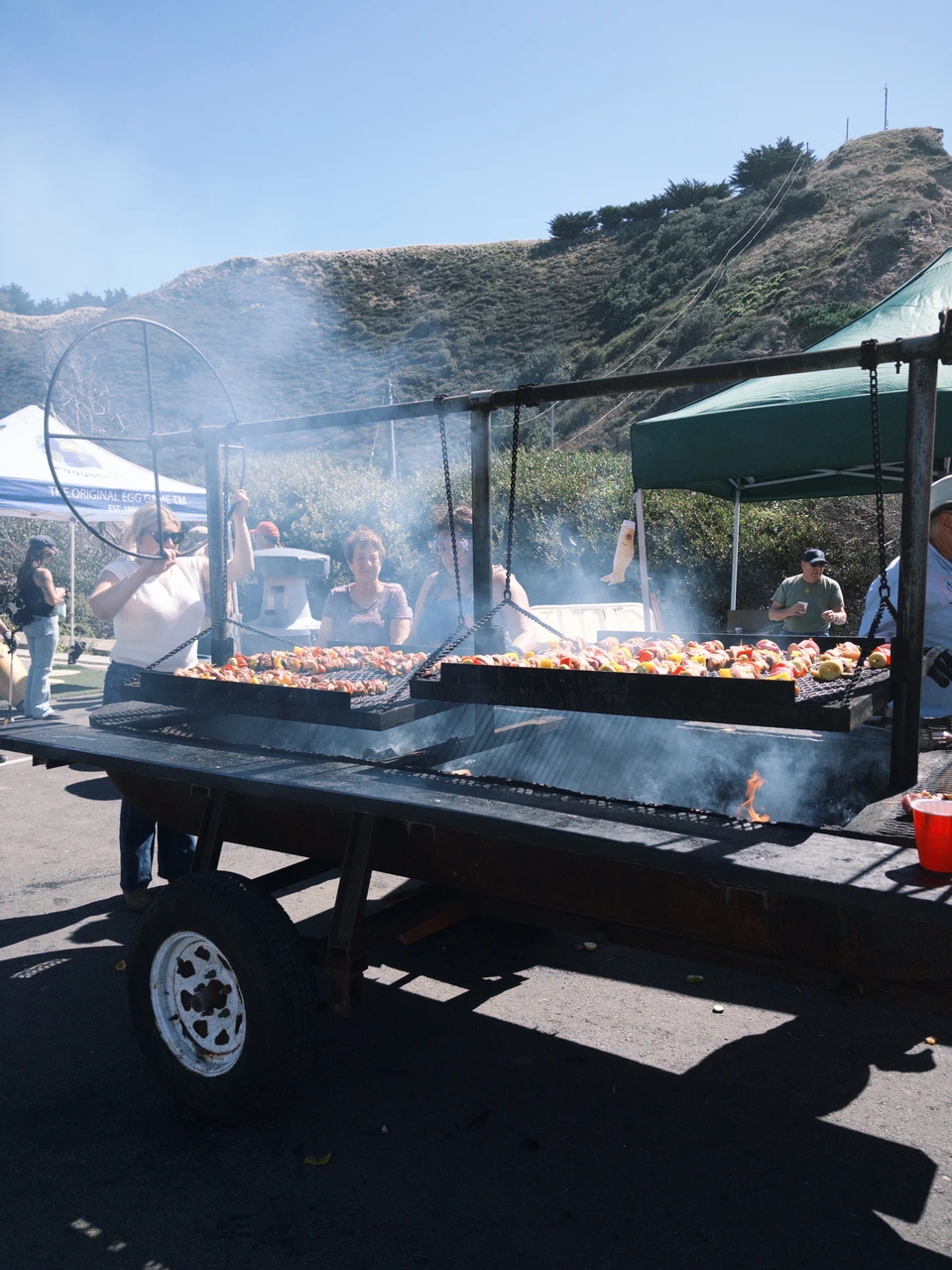Smoke rising off the long grill