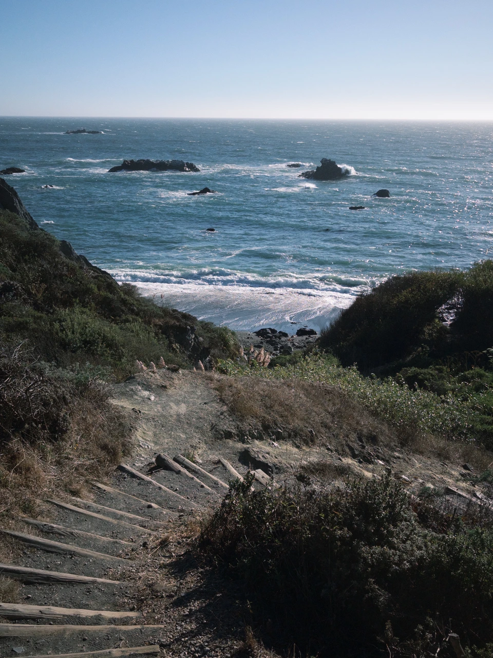 Wooden steps down to the sand