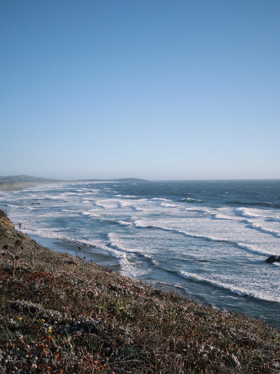 Rows of surf seen from the cliff